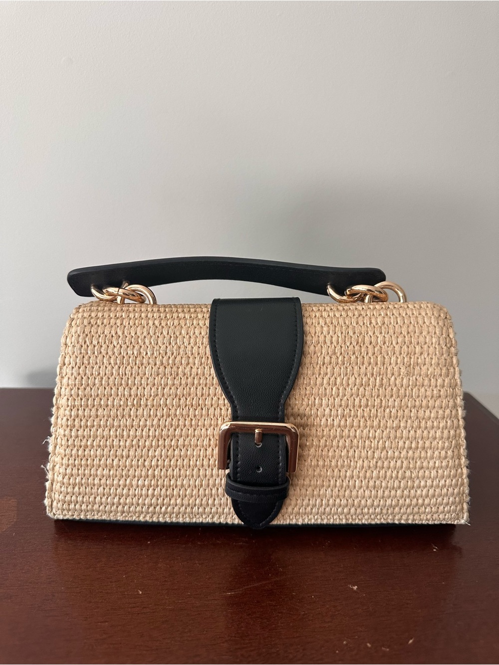 Stylish Beige Woven Top-Handle Bag with Black Accent